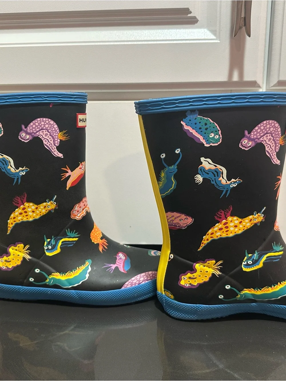 Hunter Kids Black Rain Boots with Colorful Sea Creature Print and Blue Trim
